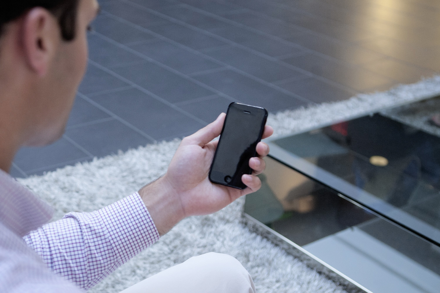 Proceedings and Other Resources: Man Holds a Mobile Phone